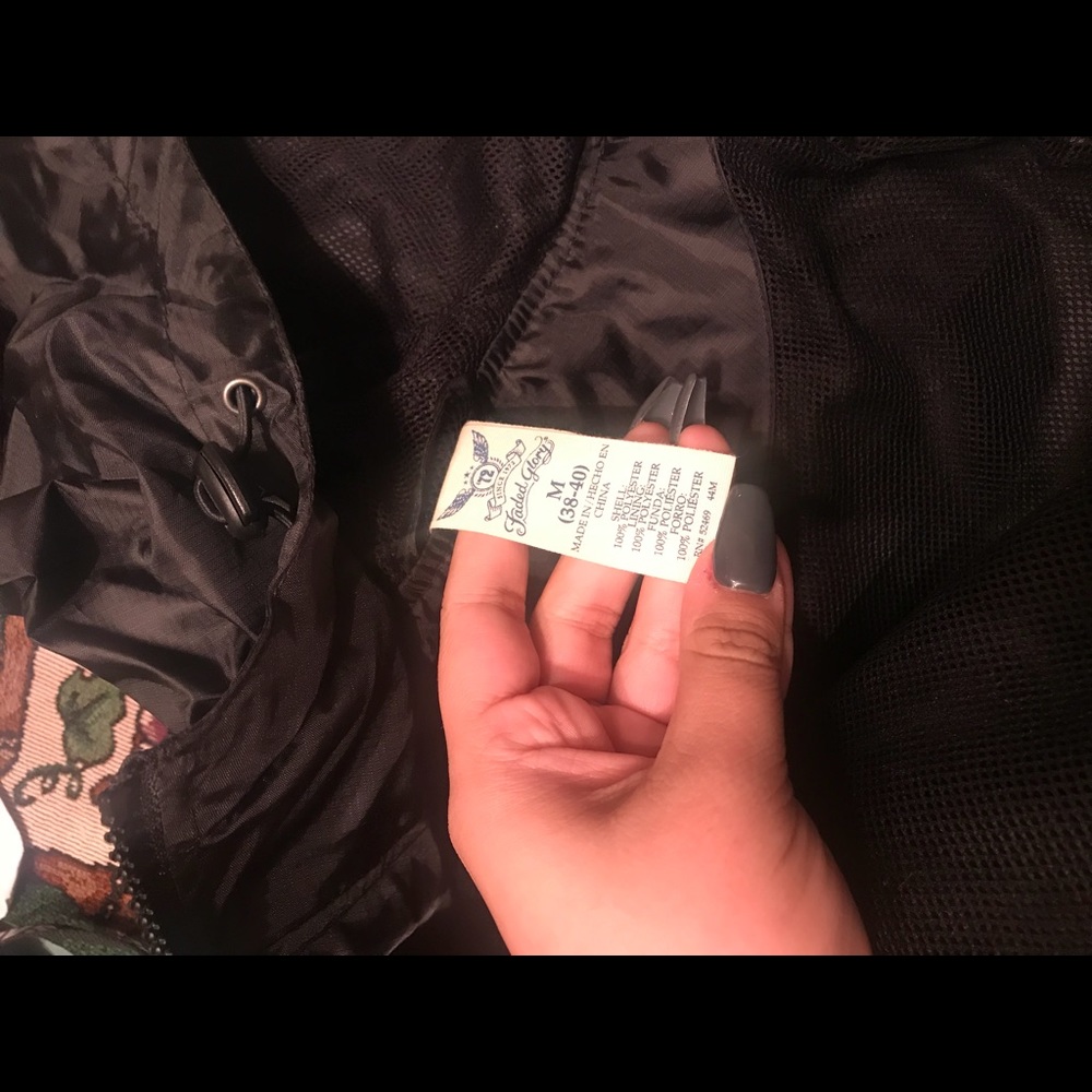 Black windbreaker size medium.